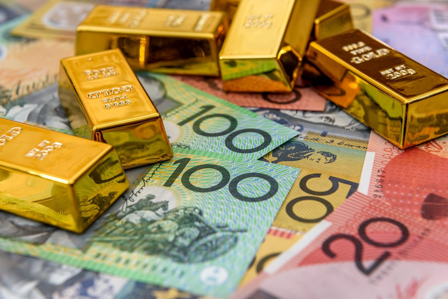 Gold bullion bars on Australian banknotes