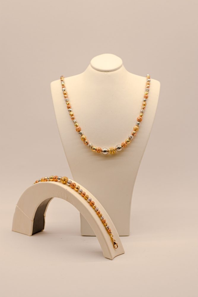 Tri-colour gold necklace and bracelet set